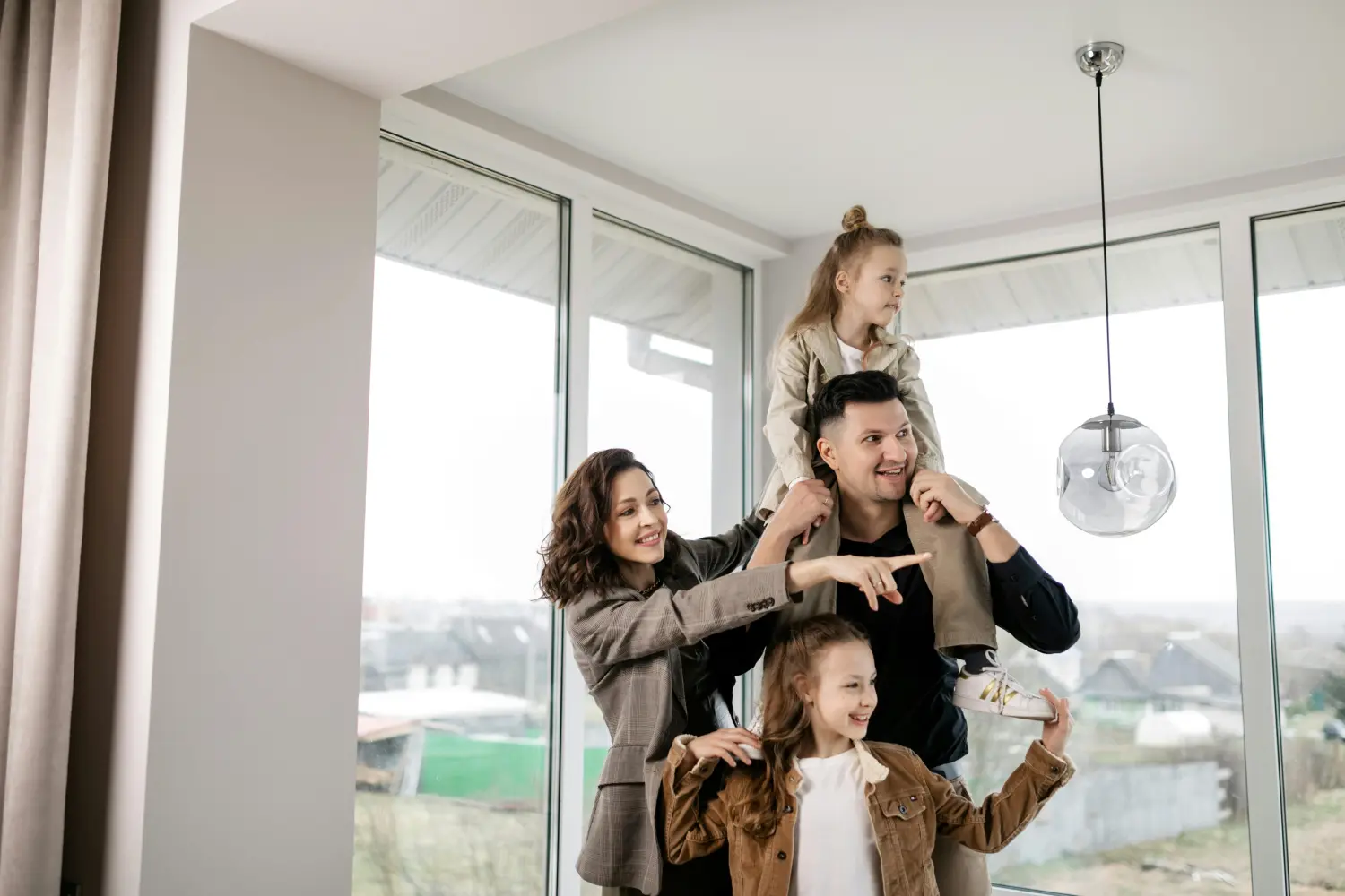 Sally Brandt Immobilien - Immobilienkonzepte - Familie genießt ihr neues Haus