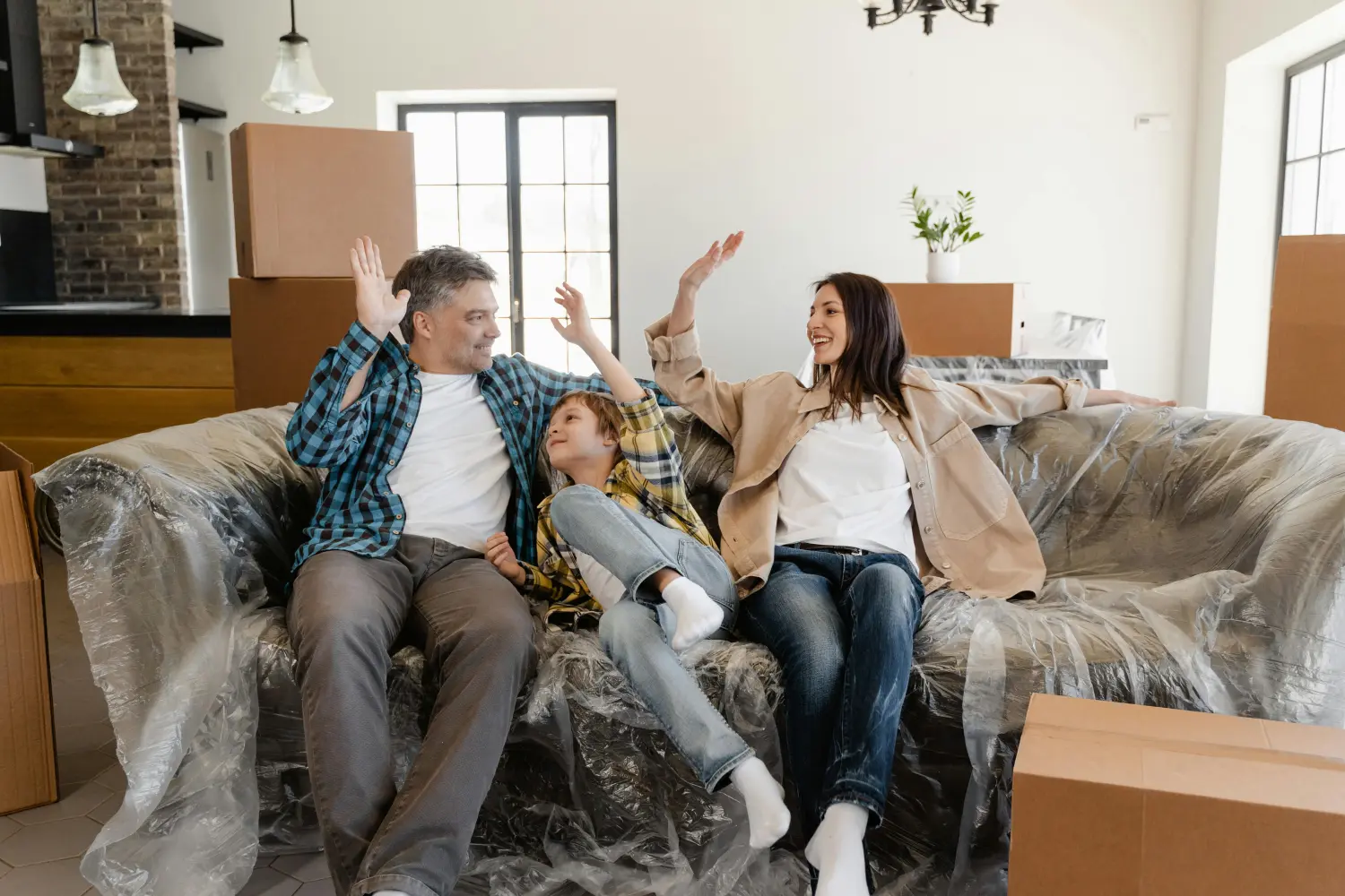 Sally Brandt Immobilien - Immobilienkonzepte - Familie genießt ihr neues Haus